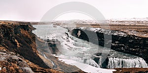 The Great Waterfall Gullfoss in southern Iceland, on the golden ring. Tourists on the observation deck.