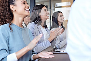 Great work. Cropped shot of a group of businesspeople applauding during a seminar in the conference room.