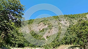 Greater Caucasus is the main mountain ridge of the Caucasus Mountains. Mountain landscape in green wally with crystal