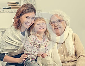 Greatgrandmother with two greatgranddaughter and granddaughter