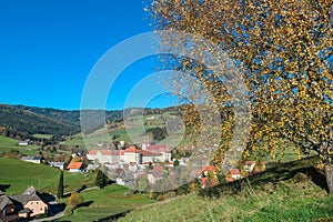 Grebenzen - Benedictine monastery Saint Lambrecht Abbey surrounded by lush green alpine landscape in mountain village Grebenzen