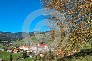 Grebenzen - Benedictine monastery Saint Lambrecht Abbey surrounded by lush green alpine landscape in mountain village Grebenzen