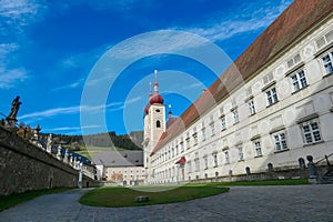 Grebenzen - Benedictine monastery Saint Lambrecht Abbey surrounded by lush green alpine landscape in nature park Zirbitzkogel