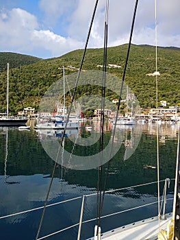 Grece Lefcada island green hills , blue sky , white yachts