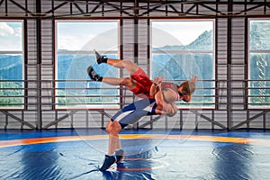 Greco-Roman wrestling training, grappling.