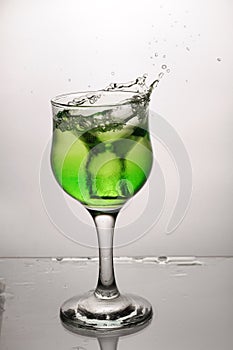 A gree cup of glass