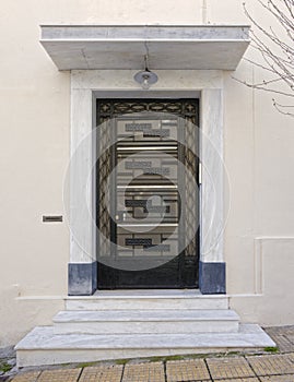 Greece Athens downtown, 60`s elegant condominium entrance metallic door photo
