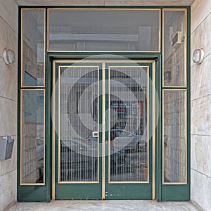 Greece Athens downtown, 60`s elegant condominium entrance metallic green frame door photo