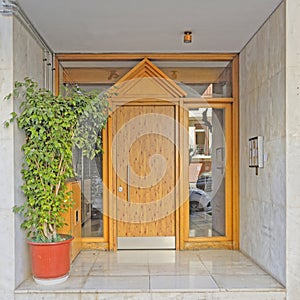 Greece Athens downtown, 60`s elegant condominium entrance wood and glass door photo