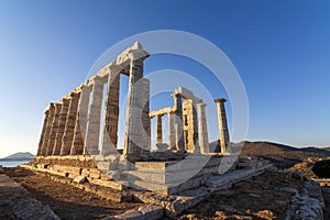 Greece Cape Sounio. Ruins of an ancient temple of Poseidon, the Greek god of the sea, on sunset