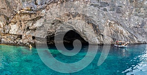 Greece cave with clear blue water  in Mediterana