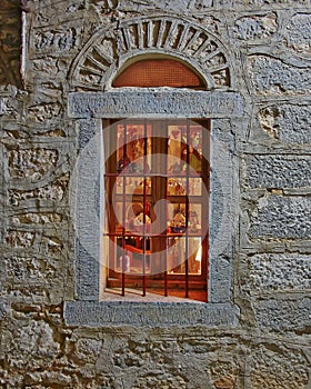 Greece, Chios island, vintage window of stone wall house