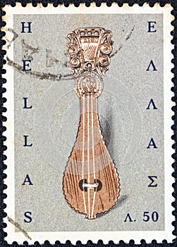 GREECE - CIRCA 1966: A stamp printed in Greece from the `Greek Popular Art` issue shows a Cretan lyre, circa 1966.