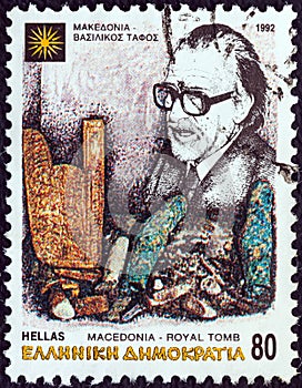 GREECE - CIRCA 1992: A stamp printed in Greece shows archaeologist Manolis Andronikos and tomb of King Philip II, circa 1992.