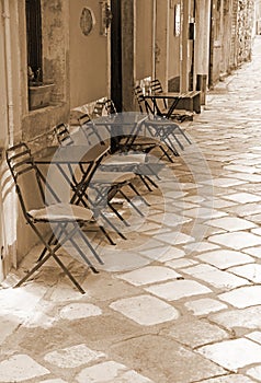 Greece. Corfu island. Corfu town. An open-air cafe. In Sepia ton