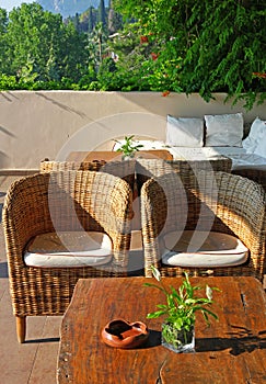 Greece. Corfu. An open-air cafe with table and chairs