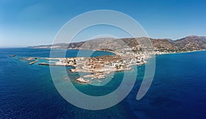 Greece, Crete island, Palaiochora town. Aerial drone panoramic view of sea water, seaside building