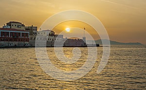 Greece, Crete, sunset in Chania Xania evening light to city ha photo