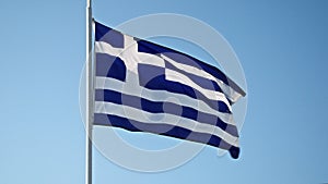 Greece flag waving in the wind against the sky