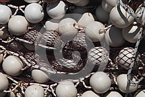 Greece- Full Frame Close Up of White Floats in Red Fishing Net