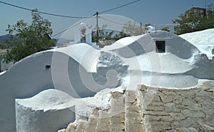 Greece, the island of Amorgos. Two chapels and a staircase.