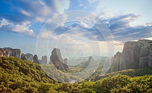 Greece Meteora panoramic view. Meteora valley rocks, monastery and sky clouds