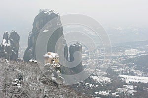 Greece. Meteora. Snow-covered Roussanou monastery photo