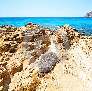 in greece the mykonos island rock sea and beach blue sky