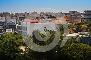 Greece, panorama of the city with rich vegetation