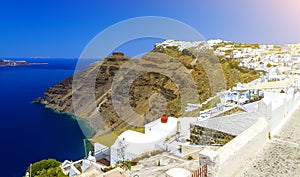 Greece, Santorini. Amazing view from famous sunset point on island in Aegean sea - Santorini over Oia - Ia village at the slope of photo