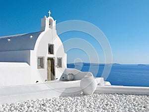 Greece, Santorini, white church over the sea, Cycladic architecture