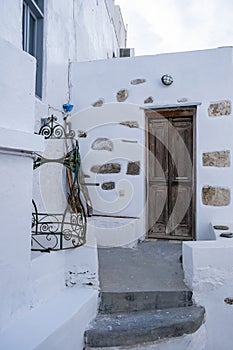 Greece, Serifos island. Traditional white building and stone stair at Chora town Cyclades