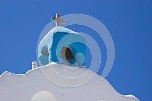 Greece the small island of AntiParos. A church bell tower.