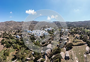 Greece. Tinos island Cyclades. Panoramic view of Volax village, granite stone background