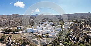 Greece. Tinos island Cyclades. Panoramic view of Volax village, granite stone background