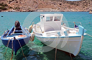 Greece â€“ Irakleia island:  Small fishing boats at bay.