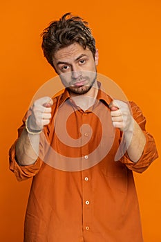Greedy avaricious man showing fig negative gesture rapacious avaricious acquisitive refusal fig sign