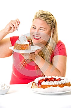 Greedy blond woman with fattening cream cakes