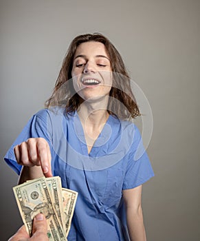 Greedy Doctor taking cash