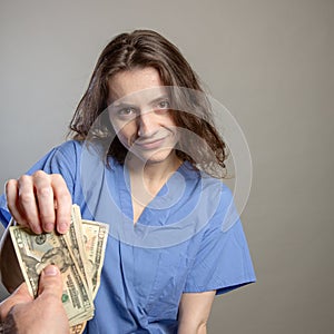 Greedy Doctor taking cash