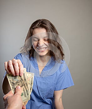 Greedy Doctor taking cash