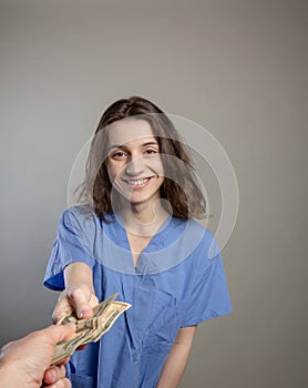 Greedy Doctor taking cash