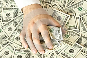 Greedy hand grabs money