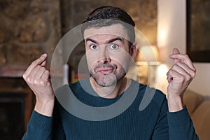 Greedy man requesting some money with hand gesture