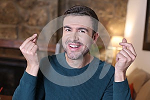 Greedy man requesting some money with hand gesture