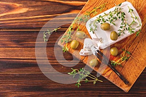 Greek cheese feta with thyme and green olives