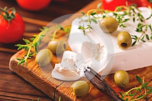 Greek cheese feta with thyme and green olives