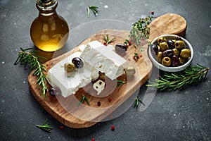 Greek cheese feta with thyme, rosemary and olives