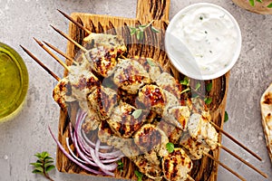 Greek chicken souvlaki on wooden skewers