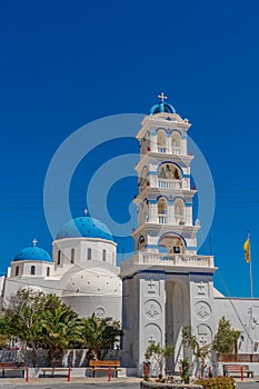 Greek church bell tower, Timiou Stavro, in Perissa, Santorini island, Greece.